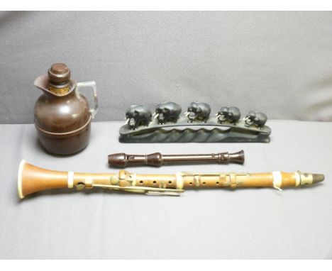 METZLER OF LONDON WOODEN CLARINET, a recorder, an ebony elephant train and a Bakelite flask