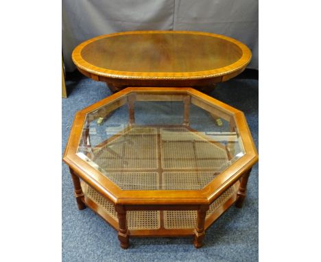 MODERN HEXAGONAL COFFEE TABLE with glass top and cane lower shelf, nest of three modern tables and an oval reproduction Long-