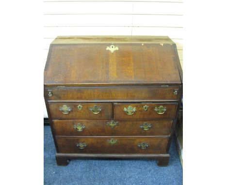GEORGIAN CROSS-BANDED WALNUT FRONT BUREAU with interior slide open well and fitted drawer, pigeon hole arrangement, oak lined