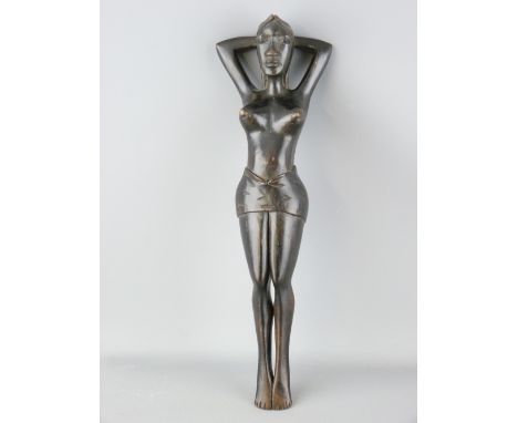 AFRICAN CARVED WOODEN NUT CRACKER of a scantily clad female, 34cms L