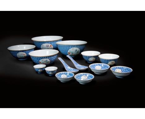 A Set of Fourteen Famille-Rose with Floral Windows serving bowls, saucers, spoons and cups 民国青花开窗粉彩 (14件）