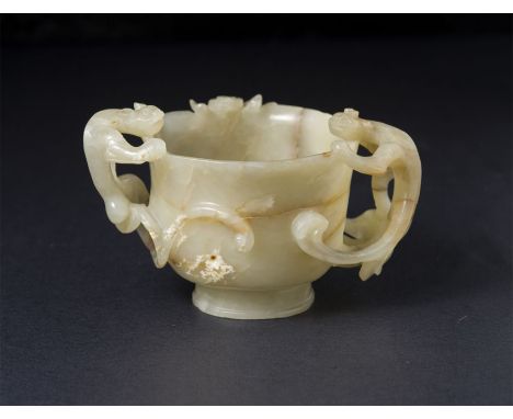 A Pale White Jade Cup Ming Dynasty (1368-1644). Provenance: Christies New York 明,白玉镂雕螭龙双耳杯 宽（Width）：13.5 cm 来源佳士得纽约