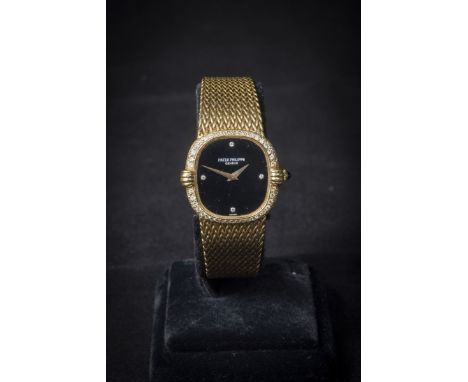Patek Philippe lady's watch with diamonds, ref. 4331/1, 18 K gold, manual winding, diamonds, black dial also with diamonds, o