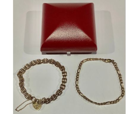 A 9ct gold gate link bracelet, love heart clasp, safety chain, marked 375, 5.8g, boxed; an Italian 9ct gold curb link bracele