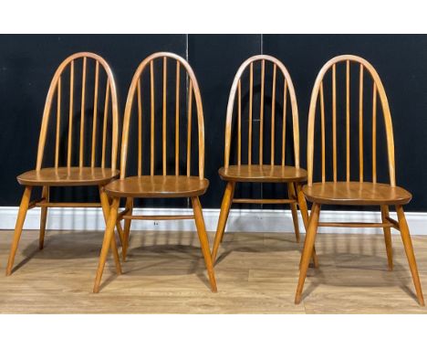 A set of four Ercol beech and elm Windsor Quaker dining chairs (4) 