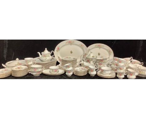 A Royal Albert Moss Rose pattern dinner and tea service, fairly comprehensive, including vegetable dishes, two teapots, two c