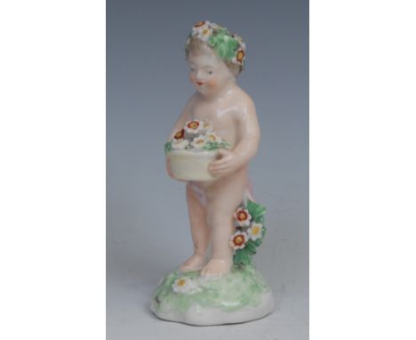 A Derby patch mark figure, Putto, garlanded with flowers, 10cm high, c.1780 