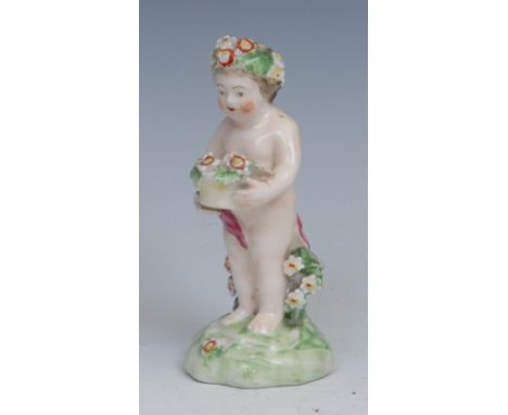 A Derby patch mark figure, Putto, garlanded with flowers, 10cm high, c.1780 