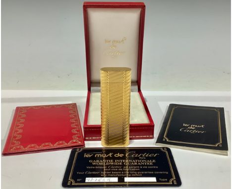 A Cartier lighter, boxed with papers 