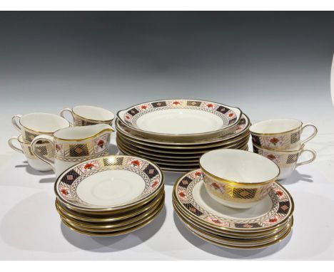 A Royal Crown Derby tea service for six, Derby Border, comprising cake plate, side plates, cream jug, sugar bowl, cups and sa