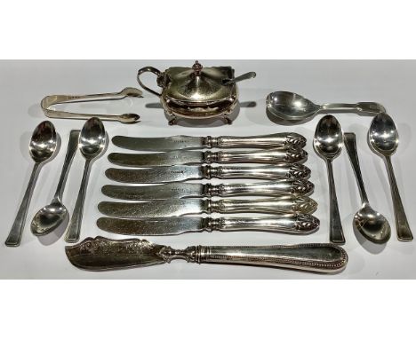 A set of six silver teaspoons, Birmingham 1937; a pair of silver sugar bows, Sheffield 1936; a caddy spoon, London 1865; a si