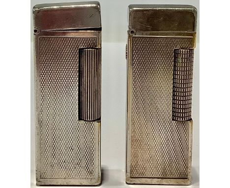 A Dunhill silver plated cigarette lighter; another (2) 