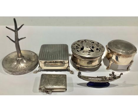 A silver trinket box, hinged cover, four leafed shaped feet, Birmingham 1910; others similar; a silver ring tree, Birmingham 