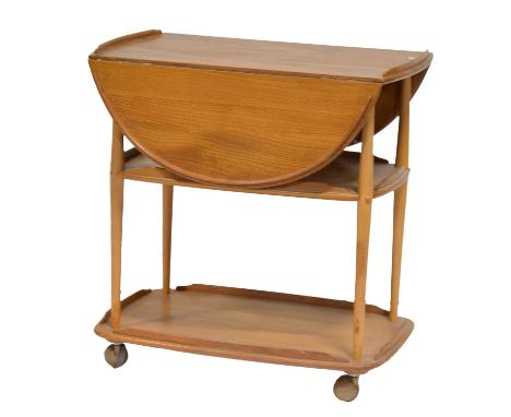 Ercol light elm three tier dinner wagon, oval top with two drop leaves, width 74cm, depth 46cm, extended 98cm, height 77cm.