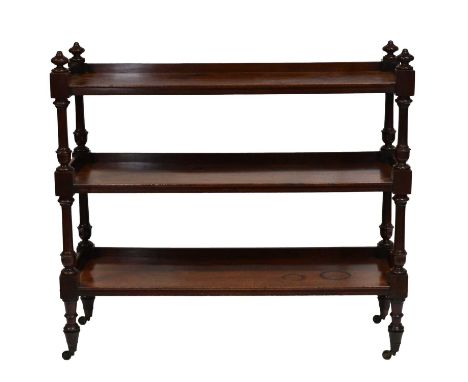 Victorian mahogany three-tier buffet, turner uprights, raised on casters, width 118cm depth 40cm height 108cm.