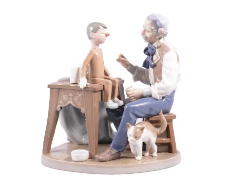 Lladro, The Puppet Painter, model 5396, depicting Gepetto and Pinocchio, height 25cm.Condition report:The puppet painter is m