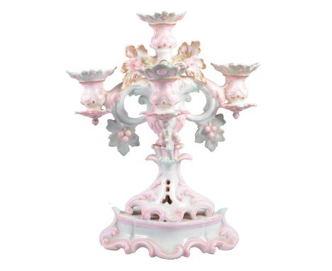 Large Continental porcelain four-branch candelabra, with fifth central sconce, scrolled arms, painted in pale blue and pink w