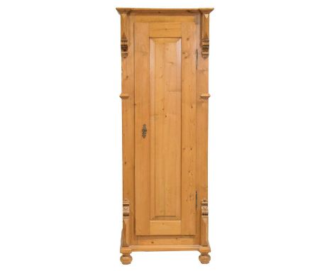 Reclaimed stripped pine single door armoire, panelled door, bun feet, width 69cm, depth 57cm, height 184cm.Condition report:T