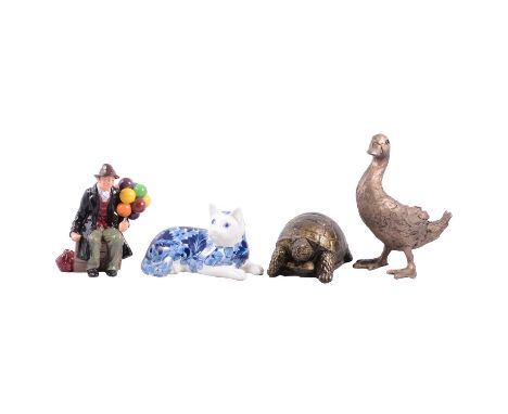Small collection of modern ornaments, including two Brian Andrews raku-fired badgers, 17cm; Royal Doulton The Balloon Man HN1