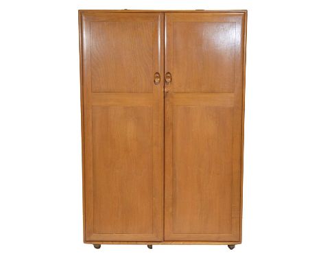 Large Ercol light elm double wardrobe, width 122cm, depth 54cm, height 183cm.Condition report:No drawers to the interior, jus