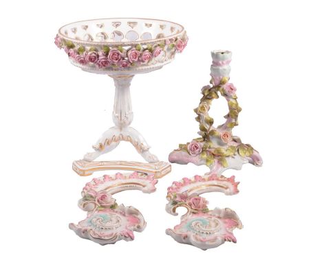 Continental porcelain centre bowl, 23cm; two scrolled Rococo-style frame sections, Kaiser porcelain; and a floral encrusted c