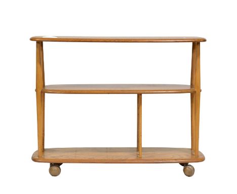 Ercol light elm three tier whatnot, open shelves, on casters, width 91cm, depth 32cm, height 102cm.Condition report:It would 