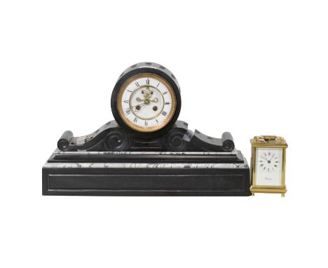 French slate mantel clock, circular drum movement, white enamel dial with visible escapement, scrolled slate support and bloc