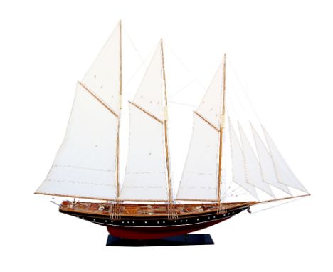 Large scale scratch built replica of a three masted racing yacht 79cm (h) x 108cm .   