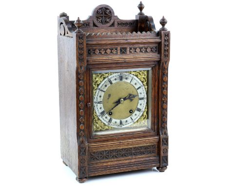 Early 20th century oak cased two train mantle clock, the eight dat movement striking on a gong 43cm high.   Case light ware d