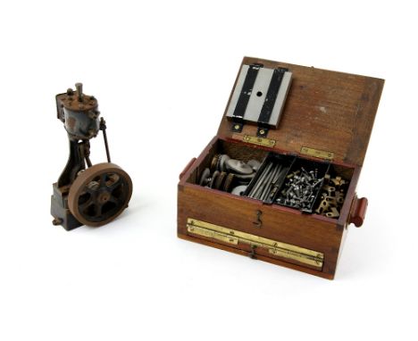 Miniature precision engineering cabinet containing screws and cogs, the hinged lid bearing brass plaque inscribed 'General Pu