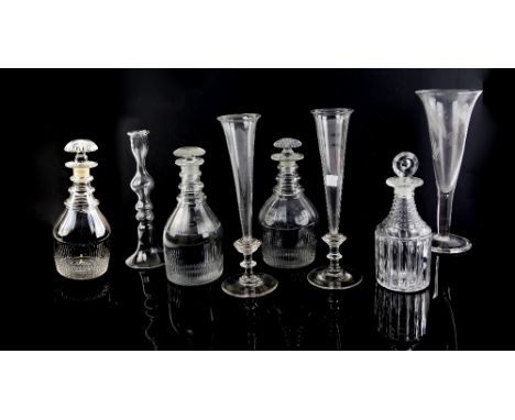 Group of glassware to include a Georgian decanter with triple ring neck and mushroom stopper, two others similar, a step cut 