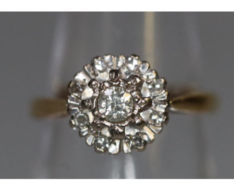 18ct gold diamond cluster flowerhead design ring. 2.9g approx, size K + 1/2. Boxed.(B.P. 21% + VAT) 