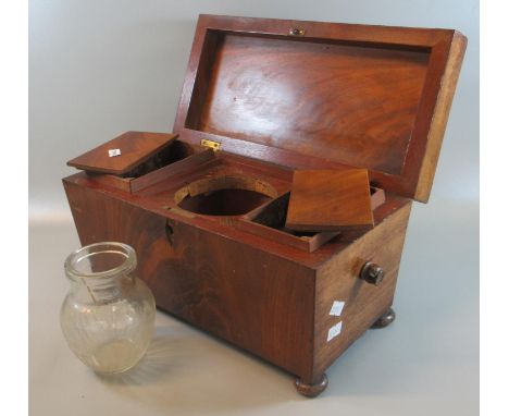 19th Century mahogany sarcophagus shaped tea caddy on pad feet. (B.P. 21% + VAT) 