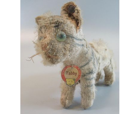A vintage Steiff "Tabby" cat, stud to its ear and label. 15cm long overall approx. (B.P. 21% + VAT) 