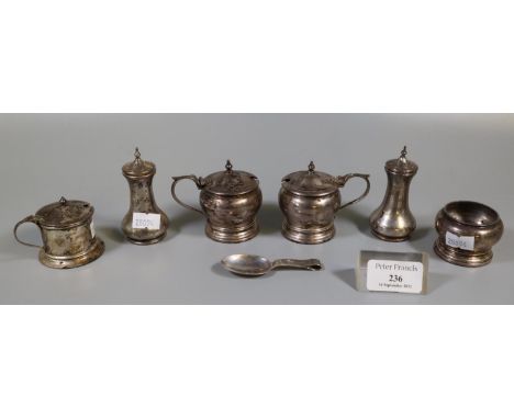 Collection of silver condiments; mustard pots, pepperettes and caddy spoon. 7.6 troy ozs approx. (B.P. 21% + VAT) 