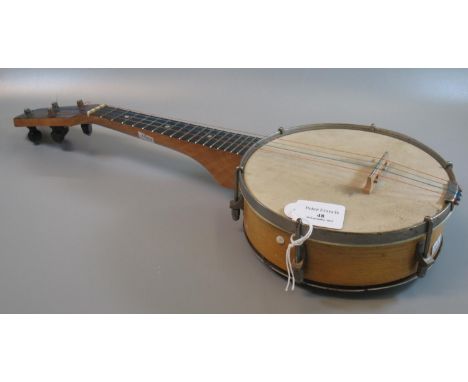 Vintage ukulele, four-string banjo. (B.P. 21% + VAT) No makers name back is badly corroded.