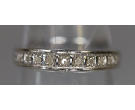 9ct white gold diamond set half hoop eternity ring. 1.4g approx, size L.(B.P. 21% + VAT) 