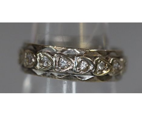 9ct gold diamond set Celtic design full hoop eternity ring. 4.8g approx, ring size O. Cased. (B.P. 21% + VAT) 