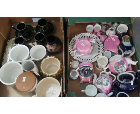 Two boxes of assorted china to include; continental pink souvenir ware, eggcups, art pottery coffee cups and saucers, caniste