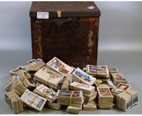 Vintage Foxs biscuit tin comprising assorted cigarette cards, Wills etc, varying genres.(B.P. 21% + VAT) 