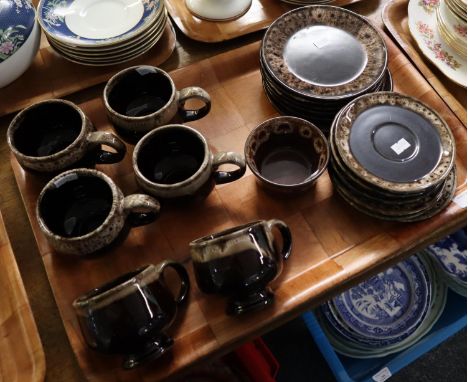 Tray of art pottery dark brown glazed teaware and a tray of Colclough floral teaware: teacups and saucers, plates, milk jug, 