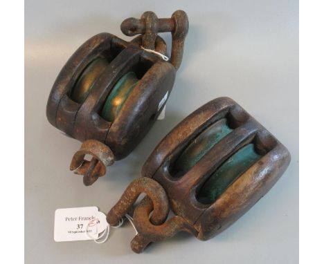 Two vintage wooden and iron rigging blocks. (2) (B.P. 21% + VAT)