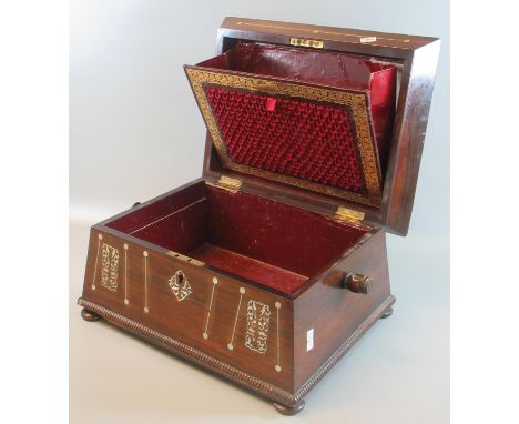19th Century rosewood and mother of pearl inlaid sarcophagus shaped writing or work box on pad feet. (B.P. 21% + VAT) Dimensi