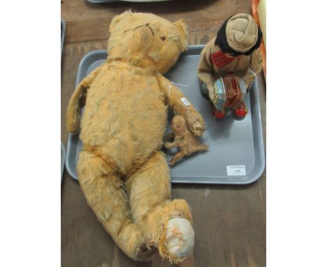 Early 20th Century mohair teddy bear with movable limbs and stitched nose, together with a Japanese tinplate clown and monkey