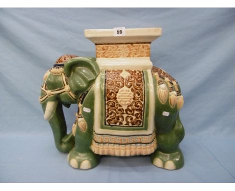 A large Chinese ceramic elephant garden seat, 44cms approx.