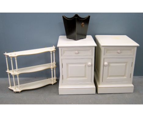 Pair of cream painted bedside cabinets, serpentine wall shelf and a waste paper bin (3) 