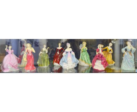 Ten porcelain figures,four Royal Doulton, to include Elizabeth HN 2946, Southern Belle HN 2425, Royal Worcester and Staffords