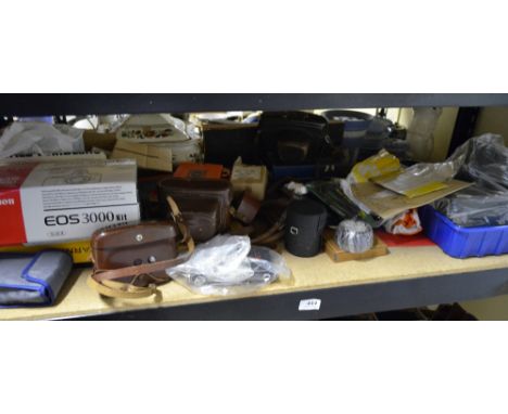 Collection of vintage cameras including a box cameras, Kodak, a leather Leica case and other accessories 