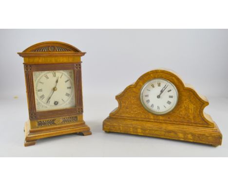 Edwardian Oak and inlaid mantle clock on brass bun feet together with another marked for LenzKirch 