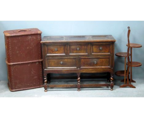 Oak five drawer chest, canvas trunk and a mahogany folding cake stand 